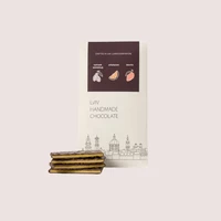 Черный шоколад с начинкой манго-апельсин